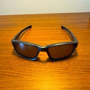 Men’s Oakleys with red logo